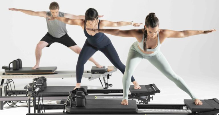 Group-of-people-on-pilates-Reformer