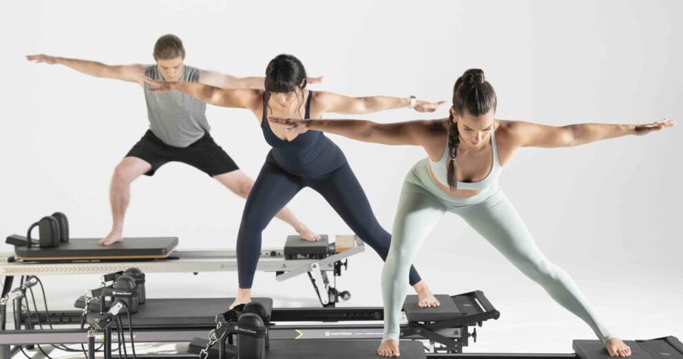 Group-of-people-on-pilates-Reformer